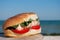 Appetizing burger sandwich on a background of blue sky and blue sea