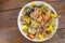 Appetizing colored farfalle pasta with vegetables