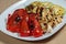 Appetizing cooked fried meat and vegetables