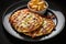 appetizing crispy fried potato pancakes with cheese and bacon in plate