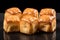 Appetizing fresh cube croissant with on black background