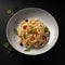 Appetizing Italian pasta on a plate on the table, close-up