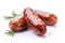 Appetizing meat sausages on a white background. Generative ai