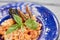 Appetizing pasta with mussels and basil.