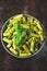 Appetizing pasta with pesto and basil.