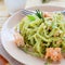 Appetizing pasta with spinach salmon