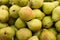 Appetizing pears on counter in market