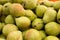 Appetizing pears on counter in market