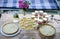 Appetizing pies and lemonade are cooked on a white wooden picnic table. Summer family vacation. Picnic. Flat lay