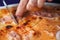 Appetizing pizza with ham and cheese/ detail