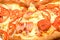Appetizing pizza pieces as background closeup