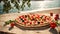 Appetizing pizza with tomatoes, olives, basil the seashore