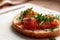 Appetizing red fish sandwich, marinated salmon, on a piece of bread with bran, decorated with chopped dill