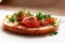 Appetizing red fish sandwich, marinated salmon, on a piece of bread with bran, decorated with chopped dill