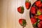 Appetizing ripe strawberries on a plate, top view, vitamin Breakfast