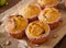 Appetizing and ruddy muffins with pumpkin