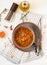 Appetizing soup with red lentils, meat, red paprika and fragrant thyme.