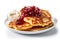 Appetizing stack of fluffy pancakes covered with luscious cranberry sauce, beautifully presented on a white plate