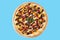 appetizing sweet kids pizza with chocolate and berries on blue background, studio shot 1