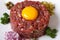 Appetizing tartare beef closeup horizontal top view