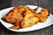 appetizing toasted plate of chicken wings on brown wooden table Crispy Buffalo Chicken Wings baked. Cafe Delites