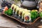 Appetizing tuna and avocado slices sushi rolls