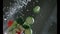 Appetizing vegetables are washed under running water in a colander. Slow motion. Very beautiful studio shot. Slow motion. Camera P