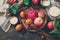 Apple baking concept. Fresh red apples and ingredients for baking on a wooden table. Copy space.