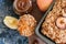 Apple crumb bread served in a baking form on a blue stone background. Close up.