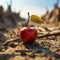 Apple on desert soil symbolizes water scarcity, hunger, agricultural challenges amid climate change