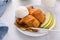 Apple dumplings baked in a dish, overhead shot