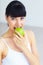 Apple, eating fruit and portrait of woman with organic product, fiber snack or morning nutrition for healthy balance