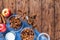 Apple granola with spices in a glass bowl on a wooden table