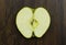 apple green juicy fresh tropical sliced exotic vitamin fruit on a wood