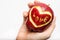 Apple,heart,love in woman hand isolate on white background