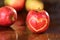 Apple heart on a wet table