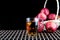 Apple juice and a box of red apples. Black background