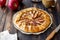 Apple open pie or galette. Baking. Vegetarian food