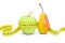 Apple and pear wrapped measuring tape on white background