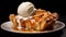 Apple pie with caramel topped with a scoop of vanilla ice cream