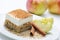 Apple pie with cinnamon, cream cake on white plate, poppy cake with cream, on-line shop photography, patisserie, sweet dessert