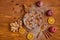 Apple pie with fresh cranberries, walnuts decorated with apples, ginger, dried orange, cinnamon. Powdered apple pie ready to eat