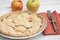 Apple pie with heart shaped crust topping