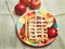 Apple Pie with Pastry Grid,Sugar Pouder,on the Ceramic Plate with Cinnamon and Pieces of Fresh Aple,Toned