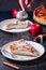 Apple Pie. Tart on a plate with spice cinnamon and anise star on dark background