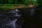 Apple river canyon state park  walkway across the river on partially submerged rocks in the water.