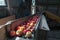 Apple sorting machine in a shed. Farm machinery scene