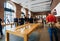 Apple Store with customers admiring the Watch 4, iPhone XS Max