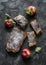 Apple strudel on a dark background, top view. Traditional autumn pastries