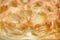 Apple strudel puff pastry close-up.